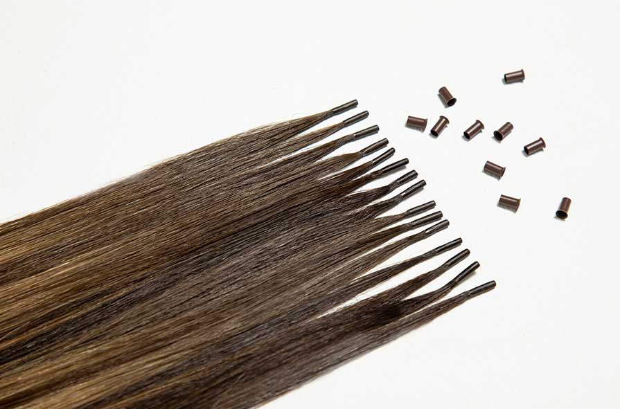 Fixed staple natural hair extensions